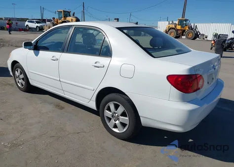 2003 Toyota Corolla Le z USA, uszkodzony, nr VIN JTDBR32E630013221